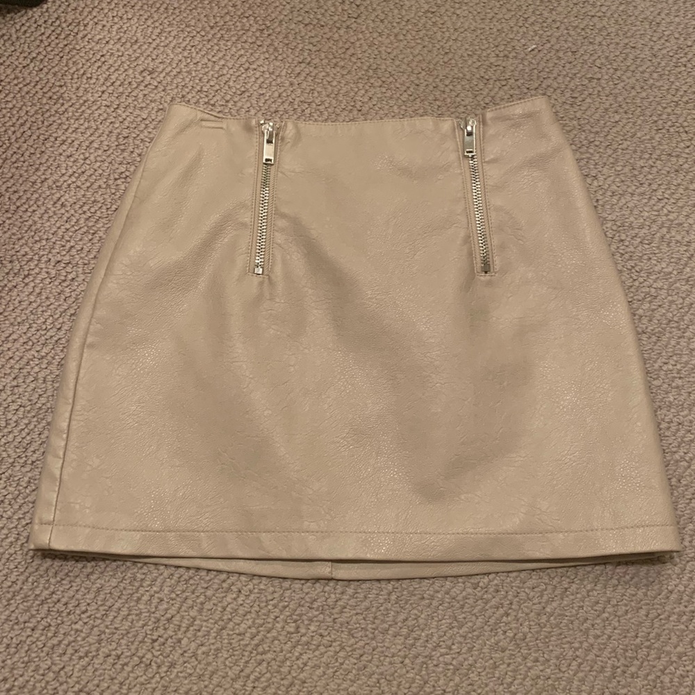 Tan leather mini skirt
